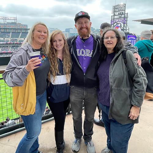 employees at a Colorado Rockies game